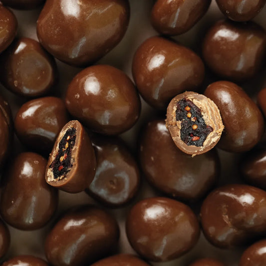 Cranberry  Bañado en Chocolate de Leche - 100 gr